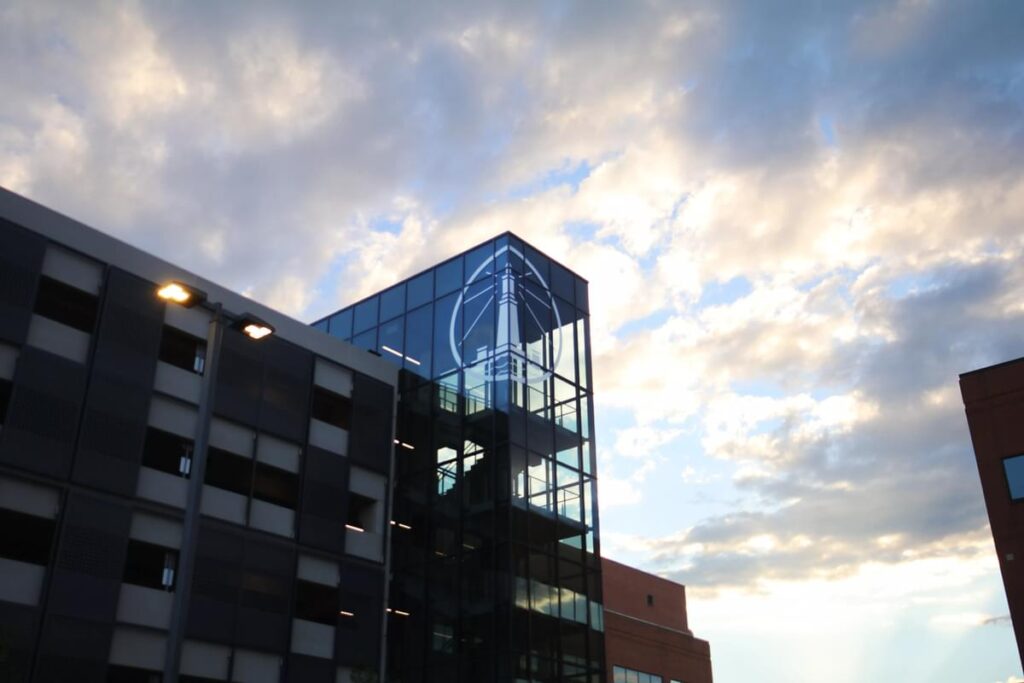 Alexandria life sciences building exterior with modern glass tower and corporate architectural branding by Gable.