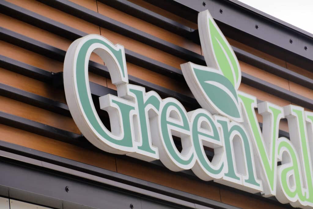Close-up of Green Valley Marketplace dimensional logo signage showcasing custom architectural branding by Gable.