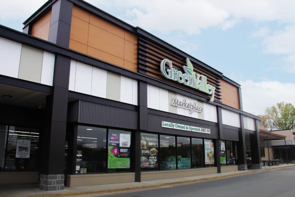 Green Valley Marketplace storefront with custom exterior retail signage and branded visual communications by Gable.