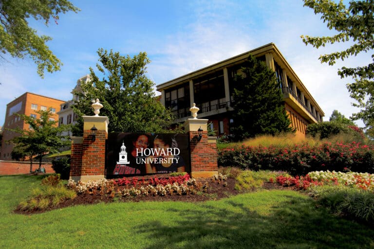 Campus digital sign at Howard University in flowerbed.