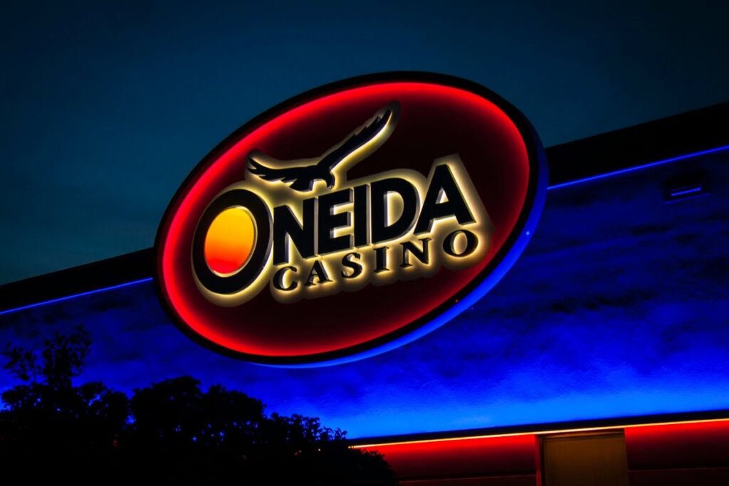 Oneida Casino illuminated exterior logo sign with custom hospitality branding and architectural signage by Gable.