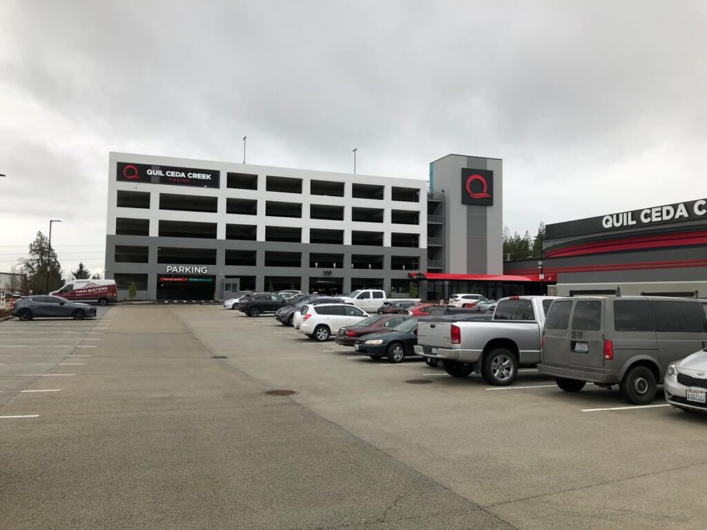 Quil Ceda Creek Casino parking garage and surface parking area with branded exterior signage.