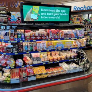 Overhead End Cap Display at Convenience Store