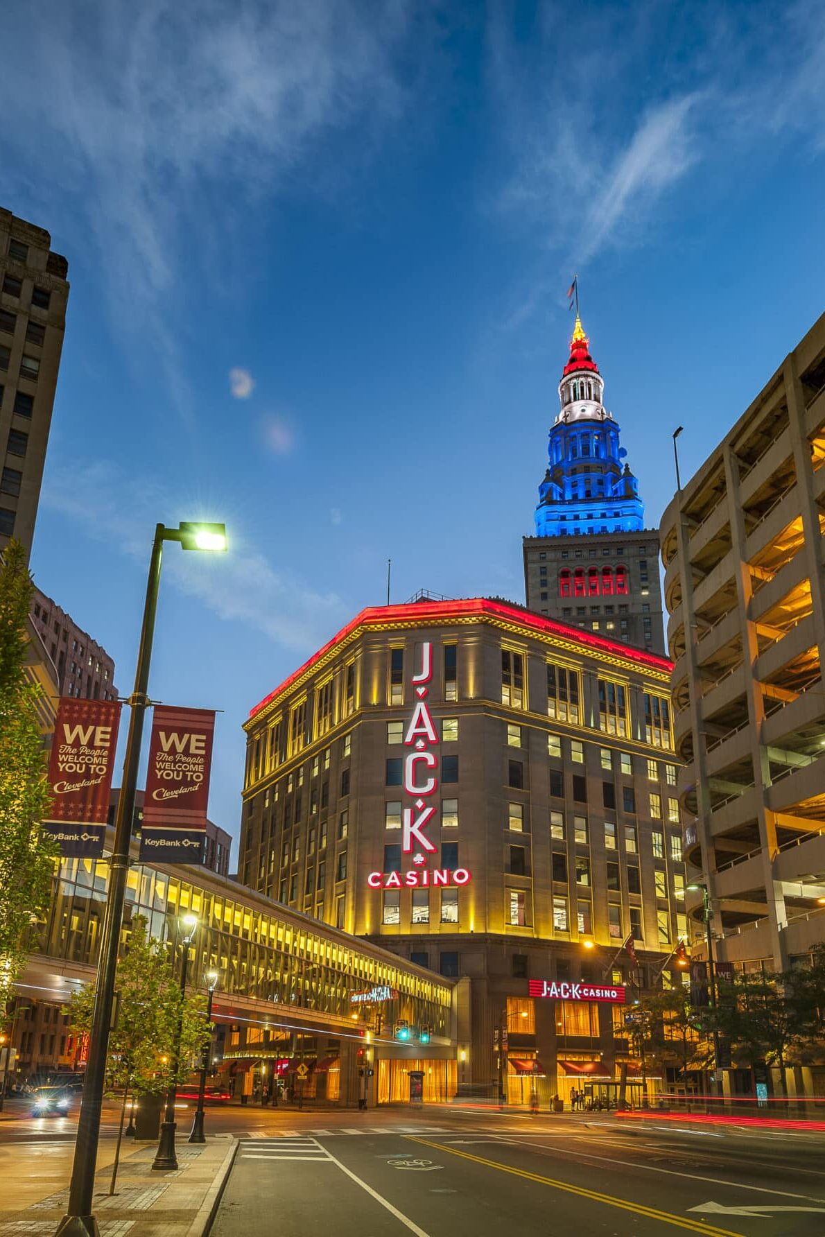 JACK Casino exterior at dusk with illuminated vertical signage and architectural lighting in downtown Cleveland, by Gable.
