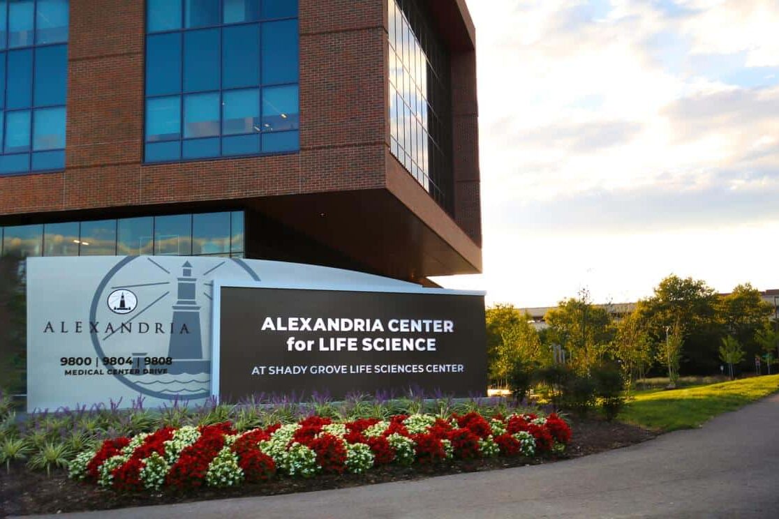 Alexandria Center for Life Science gateway sign with landscaped monument branding by Gable.