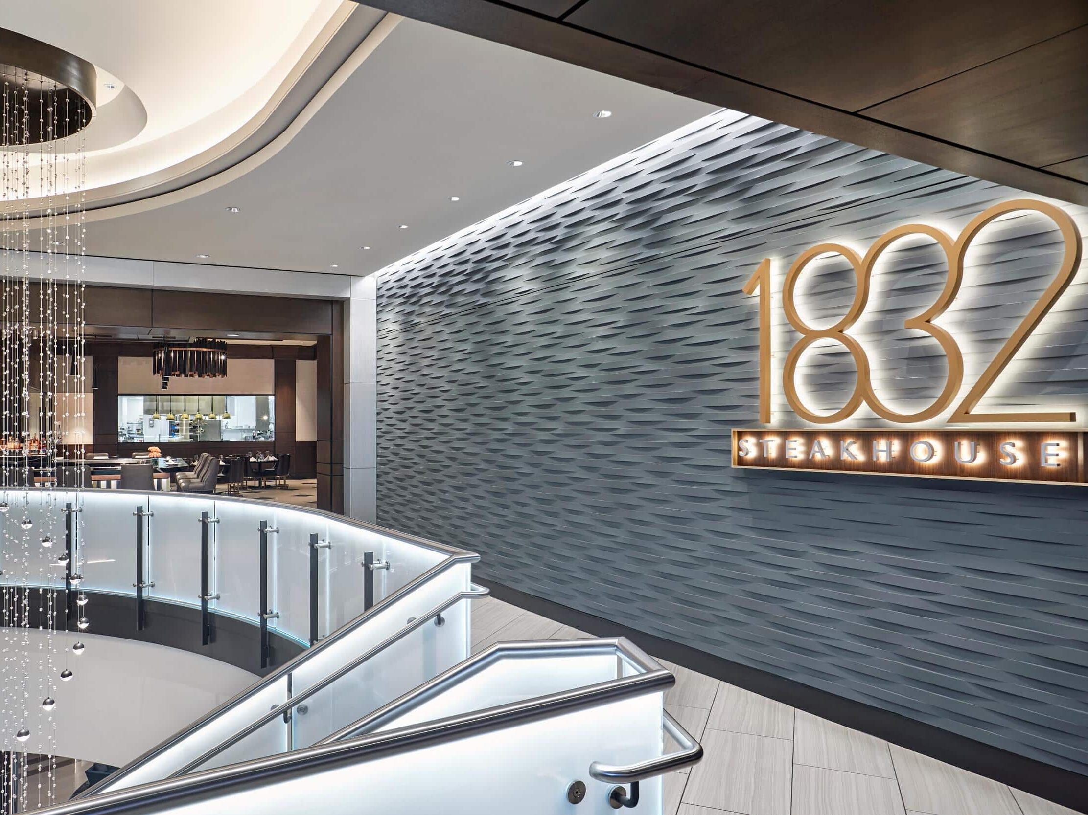 1832 Steakhouse entrance signage inside a luxury casino and resort interior.