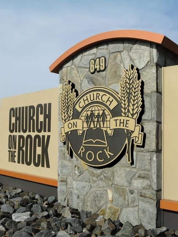 LED digital cross display on Church on the Rock in Millersville, MD, featuring illuminated worship graphics by Gable.