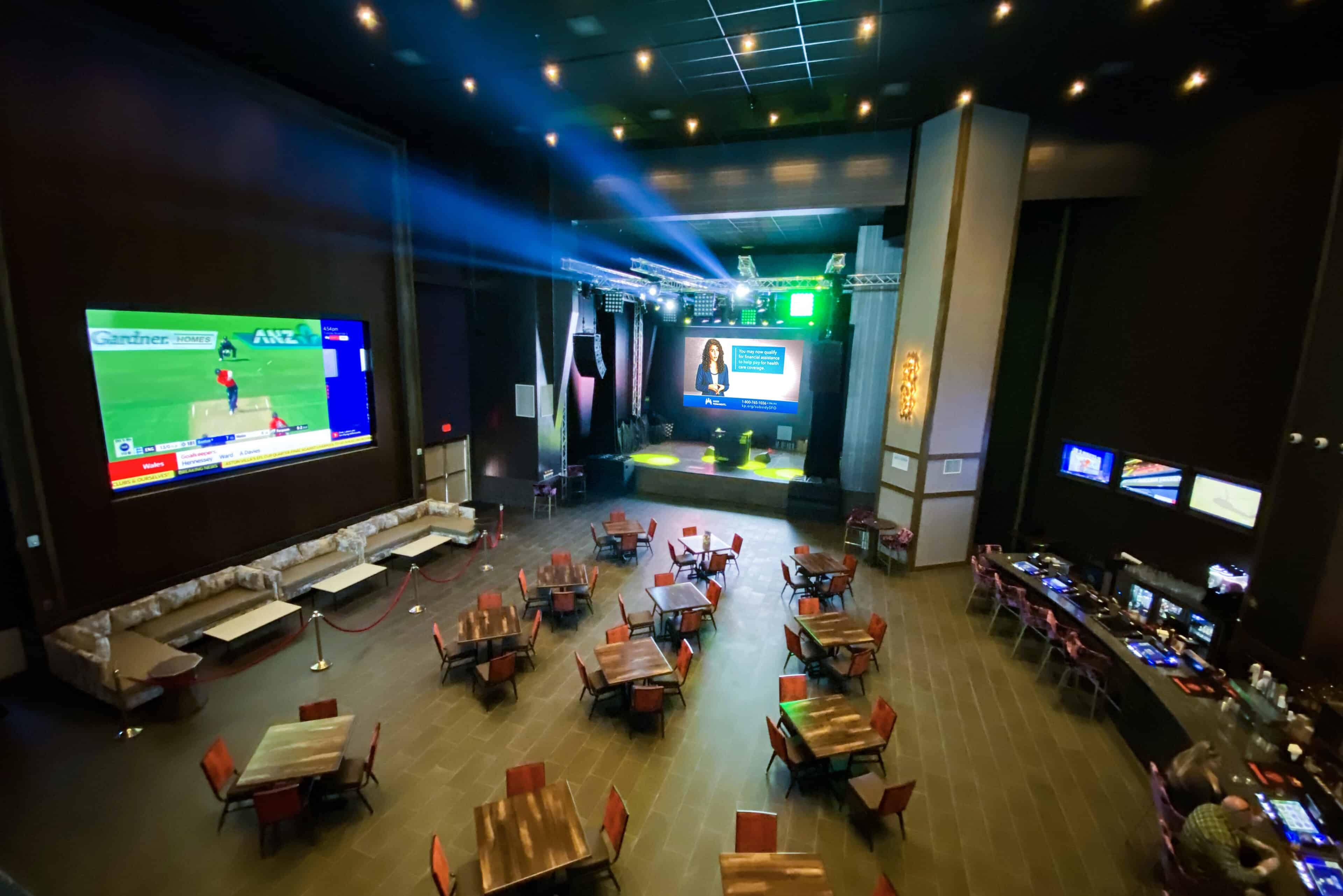 Coyote Valley Casino entertainment venue interior with large digital media screens and experiential visual communications by Gable.