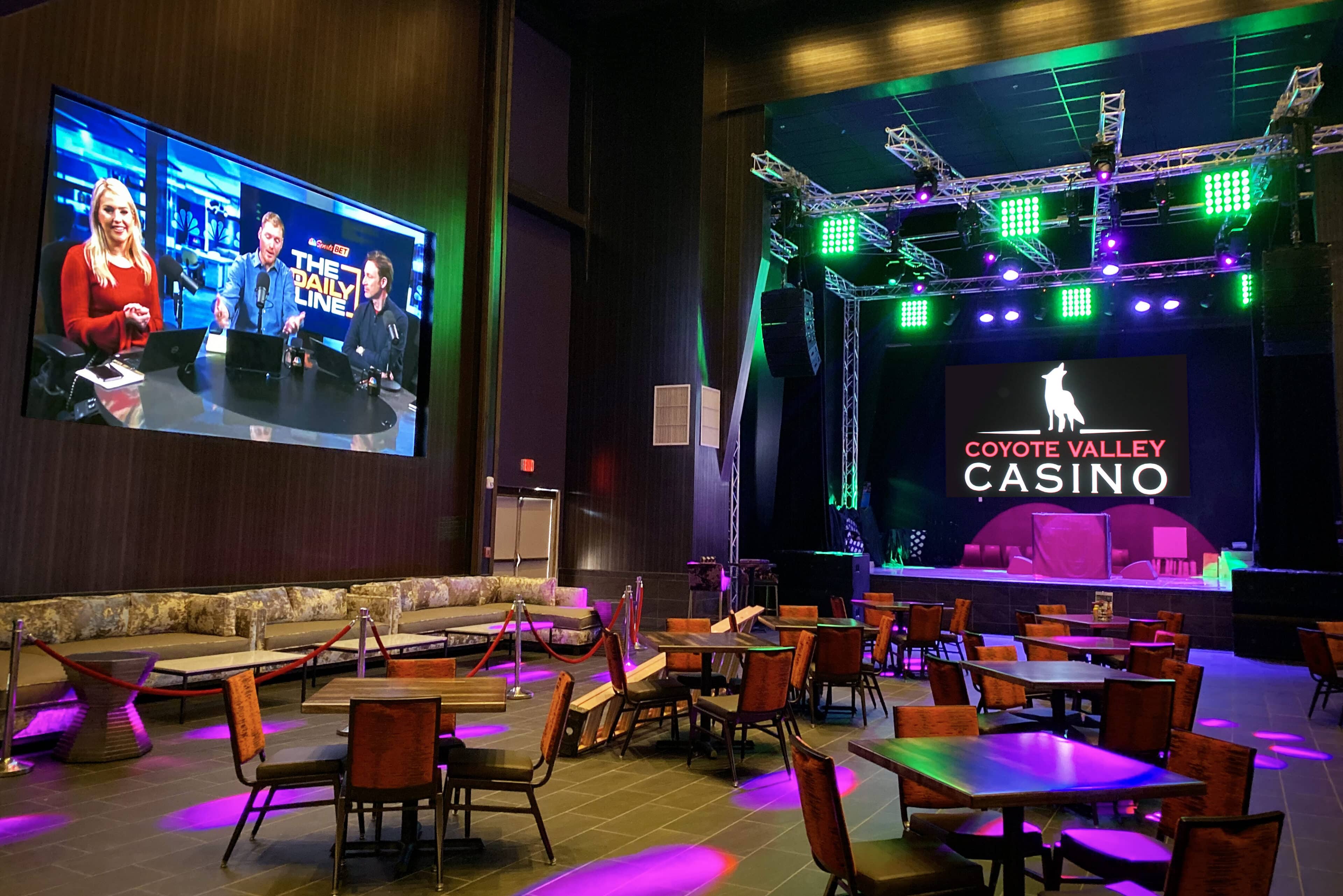 Coyote Valley Casino stage and lounge area featuring LED displays, event lighting, and branded signage by Gable.