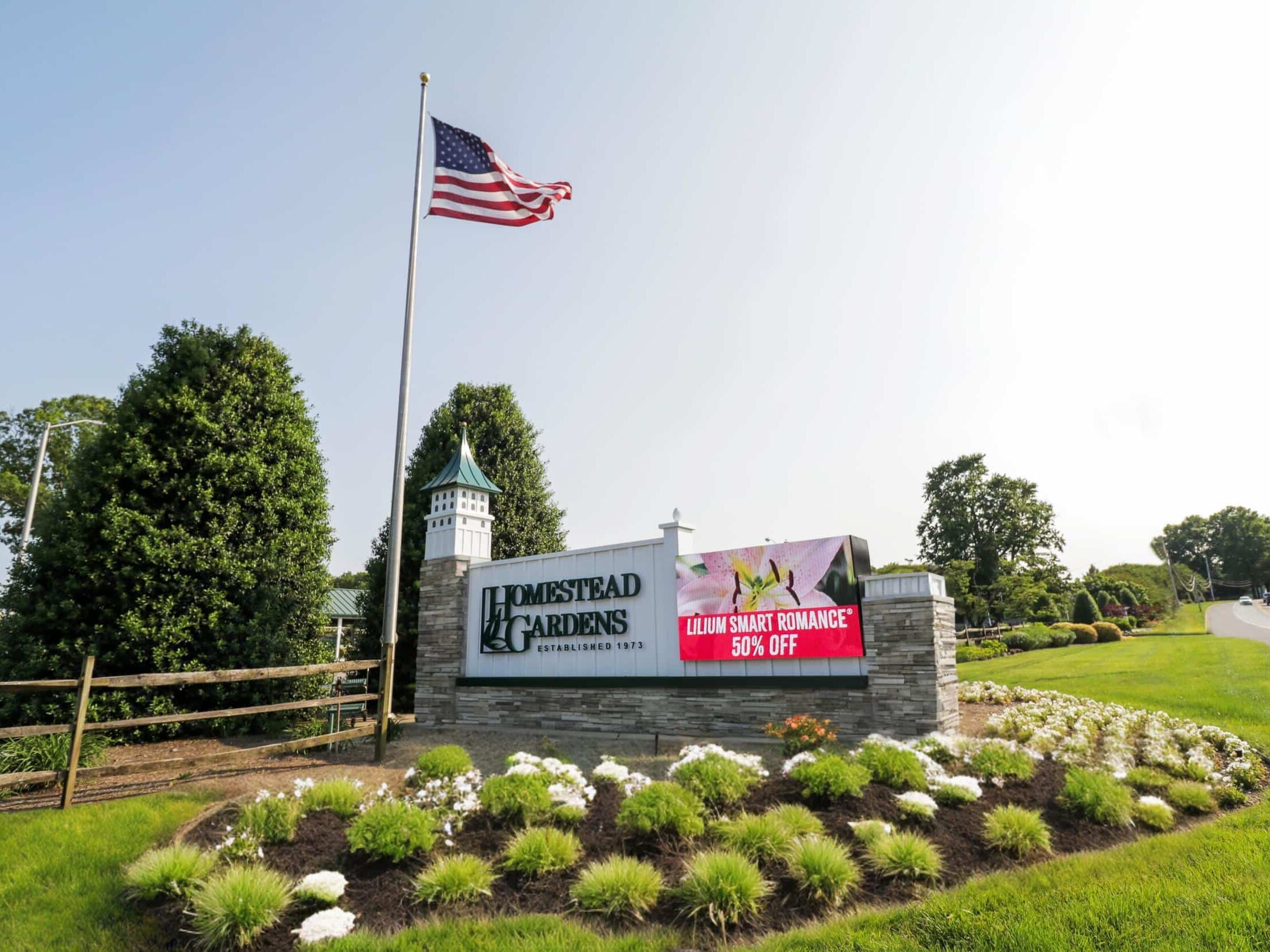 Homestead Gardens monument sign with digital display and landscaped entrance branding by Gable.