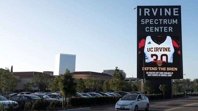 Irvine Spectrum Center exterior digital pylon sign with promotional content and branded wayfinding by Gable.