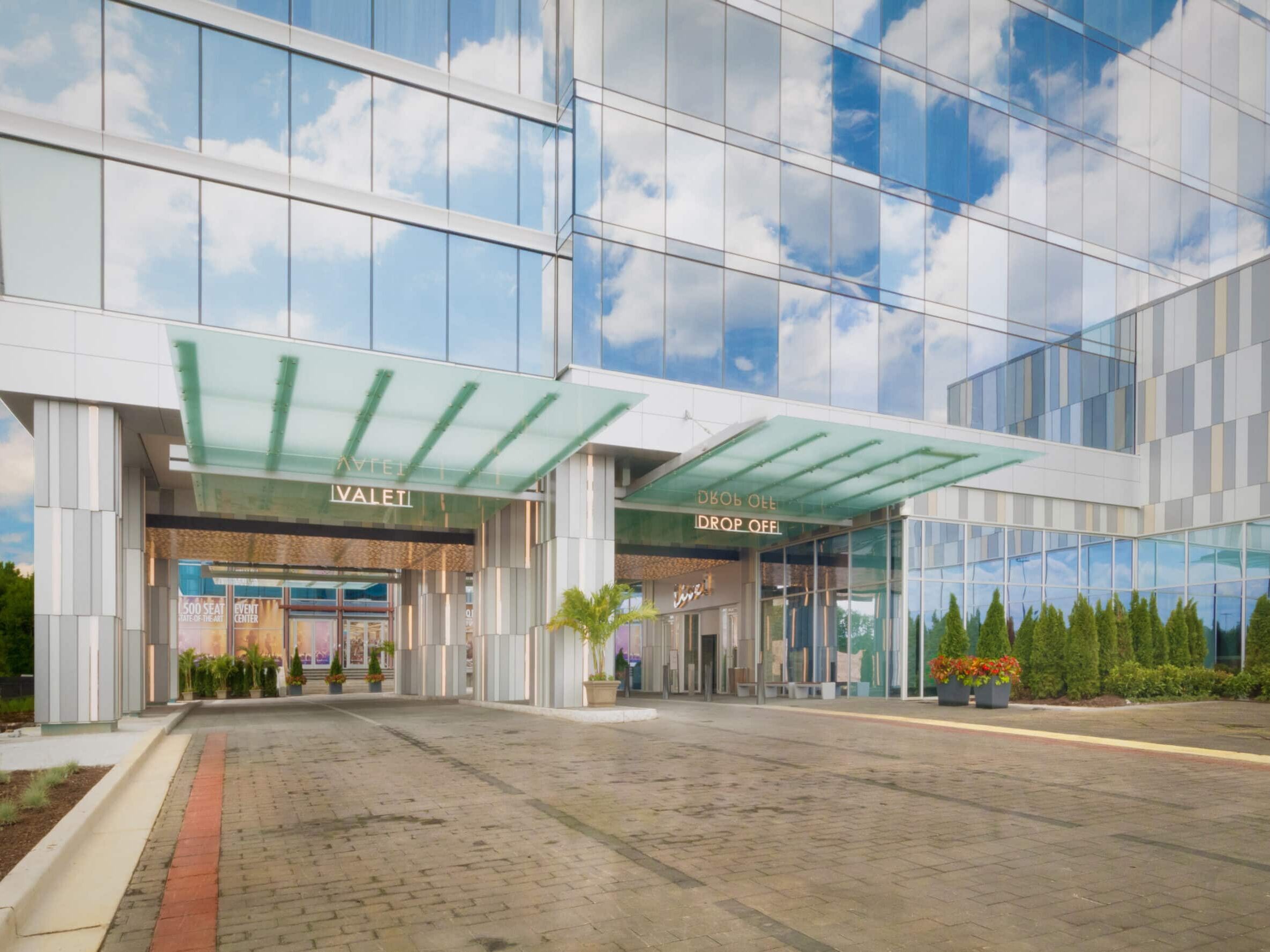 Live! Casino hotel entrance with branded glass canopy and exterior guest arrival signage by Gable.