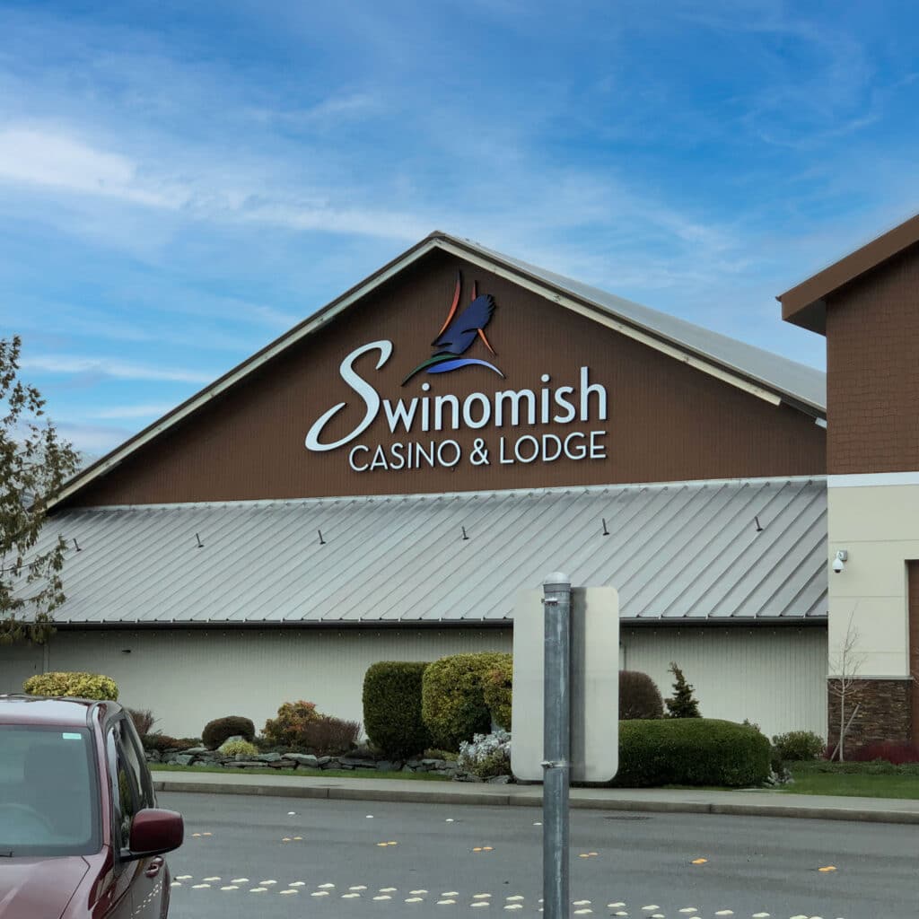 Swinomish Casino & Lodge exterior with illuminated building signage and custom hospitality branding by Gable.