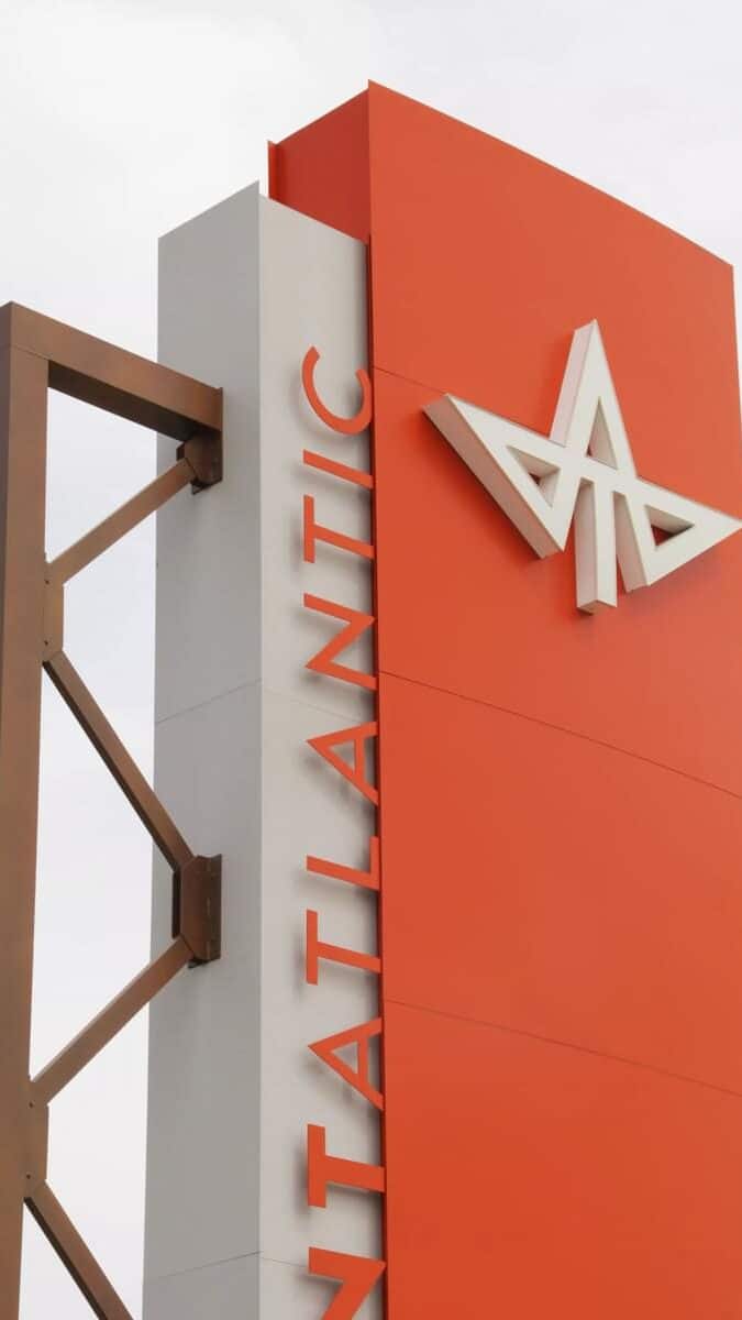 Close-up of Atlantic monument sign featuring dimensional logo elements and branded architectural signage by Gable.