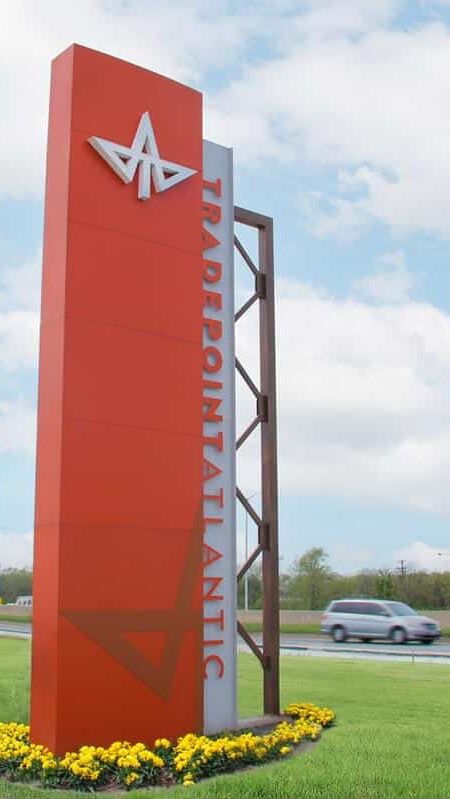 Atlantic roadside monument sign with bold architectural branding and custom exterior visual communications by Gable.